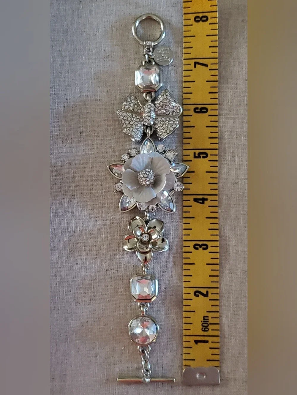​WHBM Silver Tone Crystal Rhinestone Floral Bow Statement Toggle Bracelet